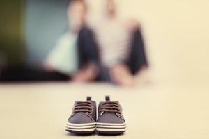 pair of blue baby shoes photo