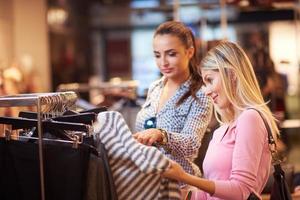 happy young girls in  shopping mall photo