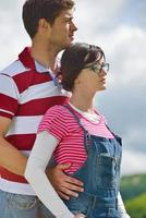 romantic young couple in love together outdoor photo