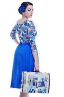 pinup retro  woman with travel bag isolated photo