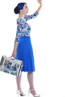 pinup retro  woman with travel bag isolated photo