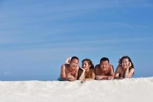 group of happy young people have fun on bach photo