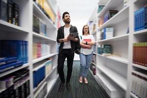 students group  in school  library photo