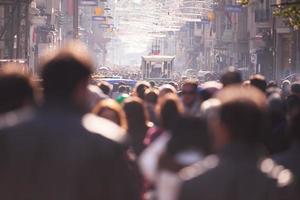 people crowd walking on street photo