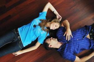 happy couple in empty apartment photo