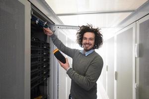 technician using digital cable analyzer photo