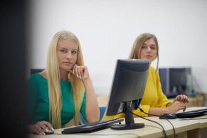 students group in computer lab classroom photo