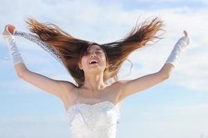 asian bride on beach photo