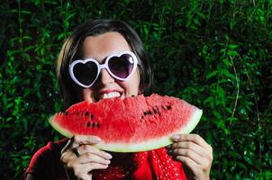 woman eating watermelon photo