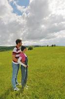 Portrait of romantic young couple smiling together outdoor photo