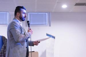 businessman giving presentations at conference room photo