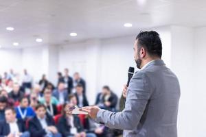 businessman giving presentations at conference room photo