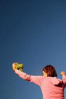 girl with grape outdoor photo