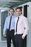 it engineers in network server room photo