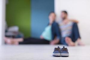 pair of blue baby shoes photo