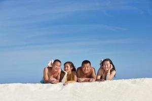 group of happy young people have fun on bach photo