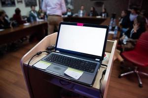 laptop computer at podium photo