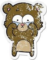 distressed sticker of a cartoon crying bear rubbing eyes vector