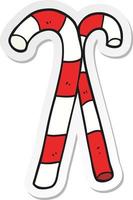 sticker of a cartoon candy canes vector