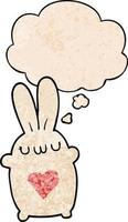 cute cartoon rabbit with love heart and thought bubble in grunge texture pattern style vector