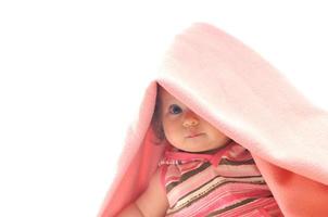 cute baby under  blanket photo