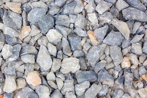 Crushed stone, construction materials, background in top view shot photo