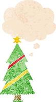 cartoon christmas tree and thought bubble in retro textured style vector