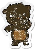 retro distressed sticker of a cartoon waving black bear cub vector