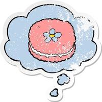 cartoon biscuit and thought bubble as a distressed worn sticker vector