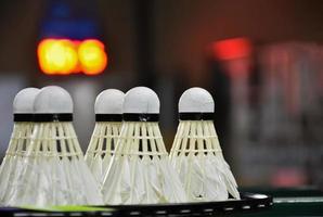 A group of the used shuttlecock after playing in a badminton court. Soft and selective focus. photo