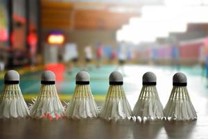 A group of the used shuttlecock after playing in a badminton court. Soft and selective focus. photo