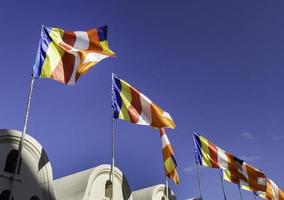 Waving colorful Buddhist Sri Lanlan Flag photo