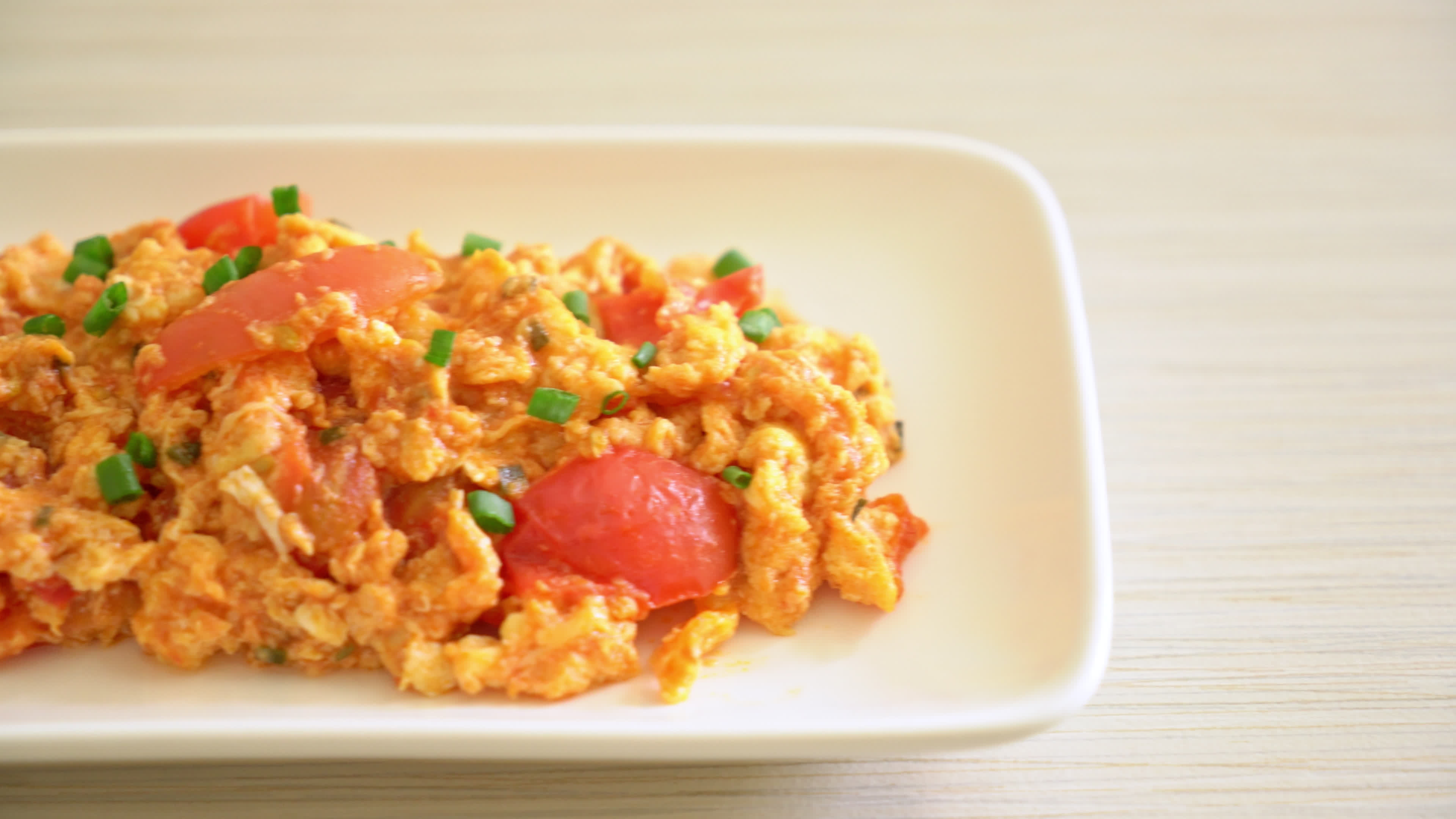 Stirfried tomatoes with egg or Scrambled eggs with tomatoes healthy