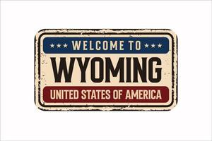 bienvenido a wyoming vintage placa de metal oxidado sobre un fondo blanco, ilustración vectorial vector