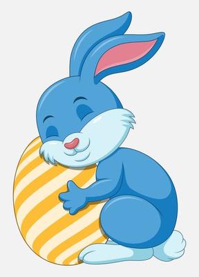 Cute blue Easter Bunny hugged egg decorated isolated on a white background