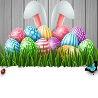 tarjeta de felicitación de pascua con dos orejas de conejo y huevos coloridos sobre fondo azul vector