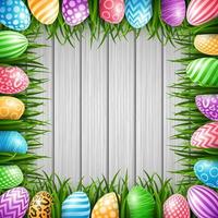 feliz fondo de pascua con huevos de colores y hierba en el fondo de la pared de madera vector