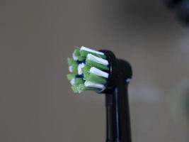 detalle del cabezal giratorio del cepillo de dientes eléctrico foto
