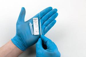 Corona virus antigen fast test. Lab card kit test for COVID-19. photo