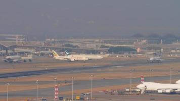 HONG KONG NOVEMBER 10, 2019 - Cathay Pacific Boeing 777 prepared for takeoff from Hong Kong. Concept of international flights, tourism and travel video