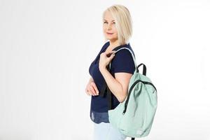 Middle age woman with backpack isolated copy space mock up photo