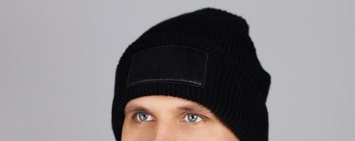 mock up - teen man in empty black hat isolated cropped image photo