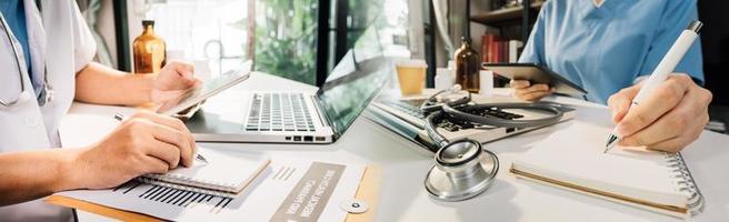 Double exposure of technology healthcare And Medicine concept. Doctors using digital tablet and modern virtual screen interface icons panoramic banner, blurred background. photo