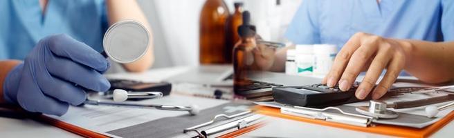 Double exposure of technology healthcare And Medicine concept. Doctors using digital tablet and modern virtual screen interface icons panoramic banner, blurred background. photo