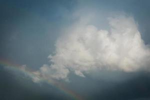 Rainbow in the clouds photo
