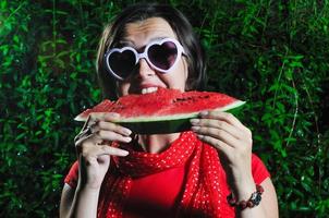 woman eating watermelon photo