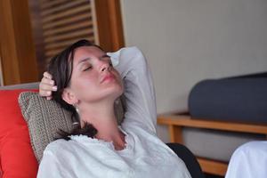 happy young woman relax at home on sofa photo