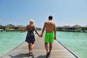 happy young  couple at summer vacation have fun and relax photo