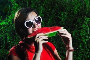 woman eating watermelon photo