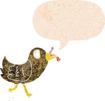 pájaro de dibujos animados con gusano y burbuja de habla en estilo retro texturizado vector